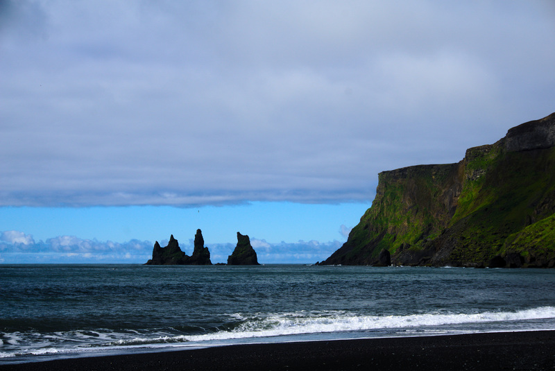 The three pillars of Reynisdrangar in the middle of the ocean